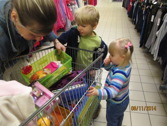 Pam, Daniel, Ariela shopping for shoe box contents