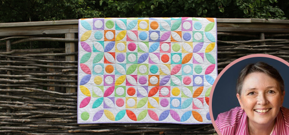 Something with curved piecing like Nancy Mahoney?  “I love the design process and designing quilts in EQ8 couldn’t be easier. Everything I need is at my finger tips. I love being able to audition blocks, settings, borders, and fabrics with the click of a mouse.” –Nancy Mahoney (NancyMahoney.com) Read more reviews >